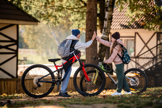children met while riding bicycles along a suburban road.