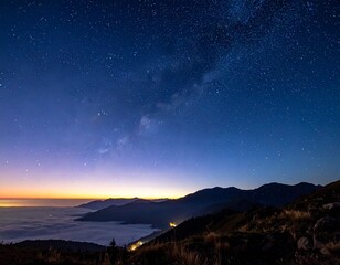 Fototapeta premium Beautiful starry night sky over a tranquil ocean and distant mountains, evoking peace and wonder