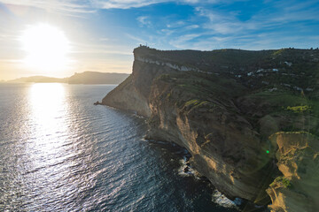 Cliffs of Cap Canaille seen from offshore, part of Route des Cretes scenic route between Cassis and La Ciotat, South of France. Coastal landscape drone view