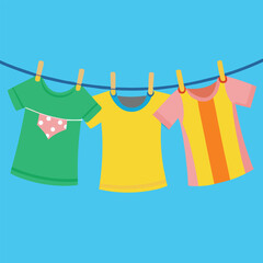 Three colorful t-shirts hanging on a clothesline in a flat design illustration