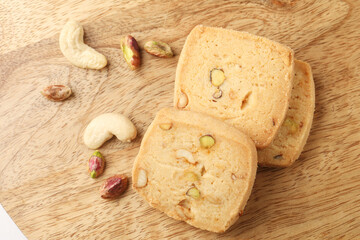 baked butter cookies with garnished dry fruits