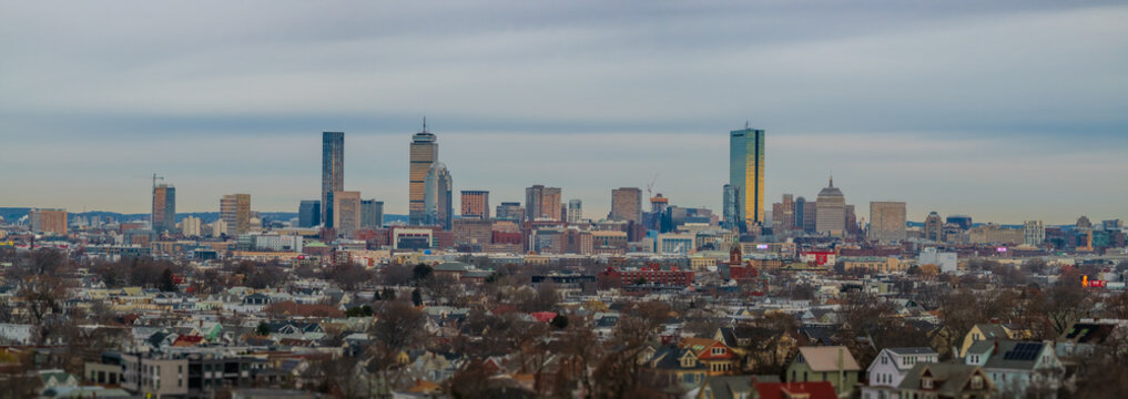 Aerial view of the cityscape, where modern skyscrapers like the Prudential Tower and 200 Clarendon Street rise above the residential areas, Boston, Massachusetts, United States.