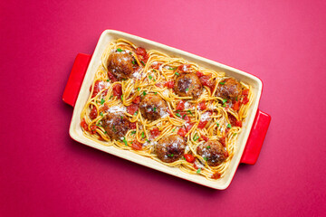 Pasta with meatballs and parmesan cheese. Italian Cuisine. Recipe.