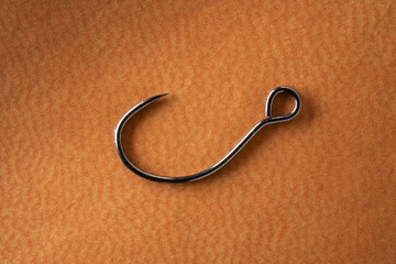 Barbless Fishing Hook on Human Skin, Catch and Release Sport Fishing Concept