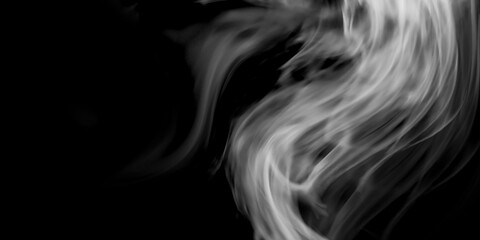 Wispy abstract white smoke curves upward against deep black background creating moody dramatic and elegant visual with ample copy space for design projects