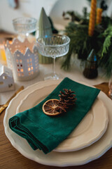 Festive table setting. Home Christmas with decor. New Year.