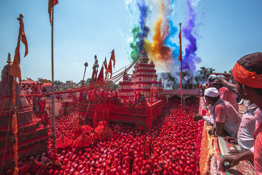 Veer, India - 05 March 2024: Aerial view of a sea of vibrant red engulfing the crowd gathered at Veer Mhaskoba Temple, Maharashtra, creating a mesmerizing spectacle.
