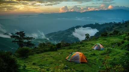 Peaceful camping in a mountainous area by a lake. A tent and a cozy campfire are located among the rocks against the backdrop of beautiful mountains and tall trees.