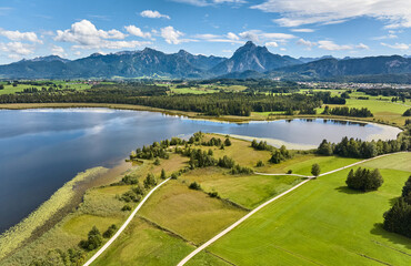 aerial photo of the alpine landscape at lake Hopfensee in the eastern Allgaeu near city of Fuessen, Bavaria, Germany 