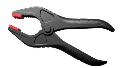 Obraz premium Black plastic spring clamp isolated on a white background