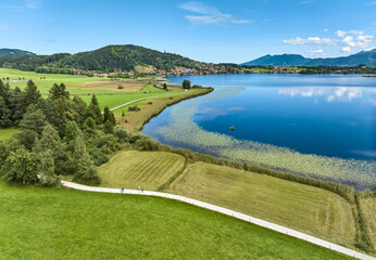 aerial photo of the alpine landscape at lake Hopfensee in the eastern Allgaeu near city of Fuessen, Bavaria, Germany 