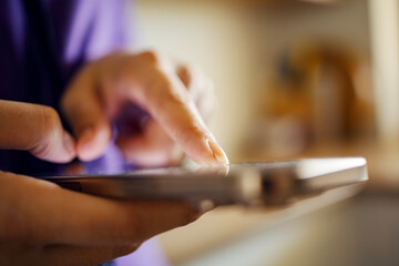 Person hands using smartphone touching screen technology