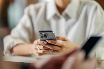 Person using smartphone for social media connection