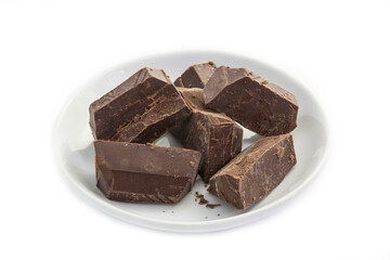 Dark chocolate in a white plate