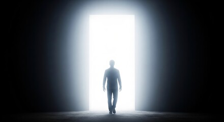 Obraz premium Man Walking Towards Bright Open Door in Dark Room Representing Hope and New Beginnings