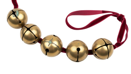 Isolated Antique Brass Jingle Bells on Red Velvet Ribbon Christmas Holiday Season Decoration