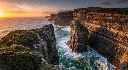 The Cliffs of Moher, a famous coastal landmark in County Clare, Ireland, with a dramatic sunset backdrop.