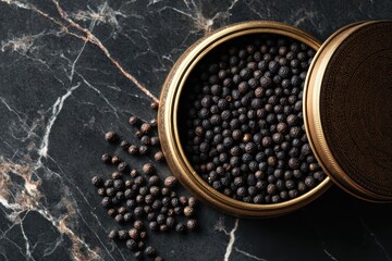 Exploring the rich aroma of black mustard seeds in a decorative tin on dark marble countertop