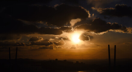 Cityscape at sunset. Beautiful clouds over the city.
