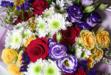 Vibrant floral bouquet with roses and chrysanthemum.