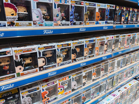 Dnipro, Ukraine 11.13.2025: A wide selection of Funko Pop! vinyl figures displayed on shelves in a children's toy store or specialty retail shop. Focus on collectible items and pop culture merchandise