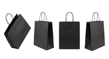 set of four matte black shopping bags with handles isolated on transparent background
