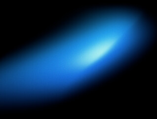 Grainy glowing blue blur gradient oval light spot on black background