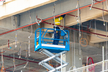 Boom Lift at a Construction Site © Adwo