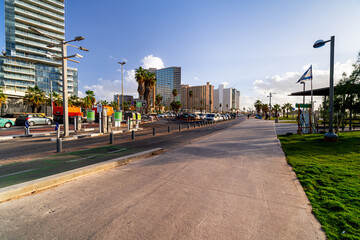 Tel Aviv palm seafront promenade, with luxury hotels. Life on the streets of Israel.