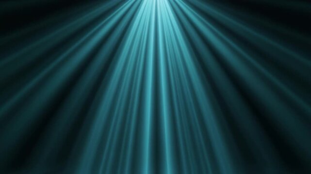 Ethereal blue light rays illuminating a deep dark space, creating a mystical glow, perfect for abstract backdrops and vibrant design elements