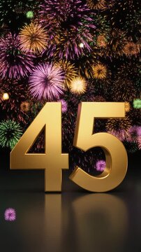 Gold number 45 with fireworks in the background. Festive scene for birthday or anniversary party