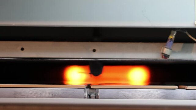 Roller Kiln for the Production of Ceramic Tiles. Firing.  Close-up. Industrial drying for ceramics. Industrial kilns for Ceramic Tiles. Manufacturing process of ceramic tiles. Ceramic Tile Making.