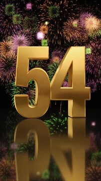 Gold number 54 with fireworks in the background. Festive scene for birthday or anniversary party