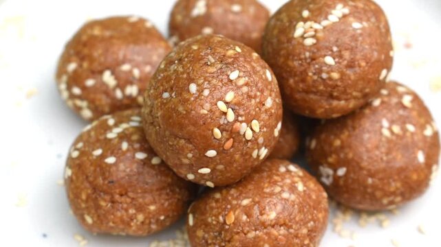 traditional Indian sweet til gur mithai made from roasted sesame seeds and jaggery, commonly prepared during winter and festive seasons such as Makar Sankranti