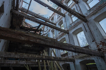 Dilapidated building with a lot of wood and debris