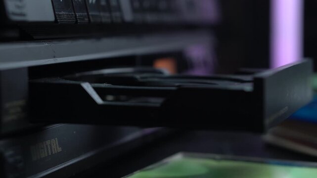 Ejecting and Taking Out Compact Disc From CD Audio Player, Close Up