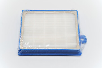 Hepa filter for vacuum cleaner on white surface
