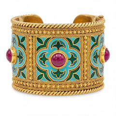 An ornate vintage gold cuff bracelet with turquoise enamel and ruby cabochons. A luxurious, ethnic jewelry piece isolated on a white background.