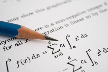 Pencil on mathematic formula exercise test paper in education school. © Warawan