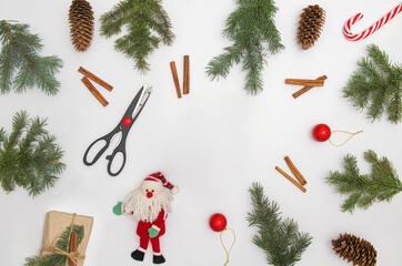 Christmas flat lay styled scene with evergreen fir tree, decorations