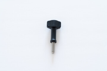 Single Black-head thumb screw vertically placed on white background