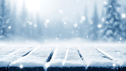 Snow covered wooden deck in a winter landscape with snowfall and trees