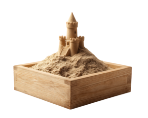 Creative sandcastle in wooden sandbox filled with sand. beautiful castle toy for childhood play representing imagination and wonderful creative dream concept