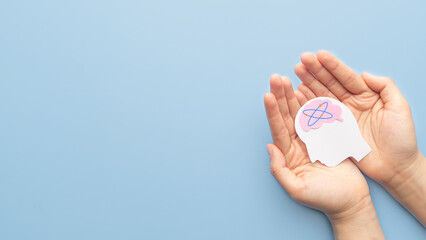 Human head with dizzy stars brain on blue background. Concept of dizziness, vertigo, headache, stress, confuse and hangover.