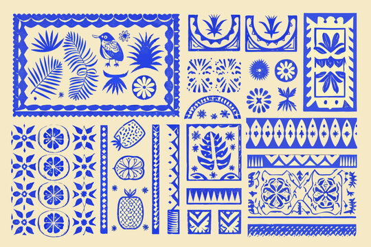 Intricate blue and white botanical and avian themed decorative paper cut designs