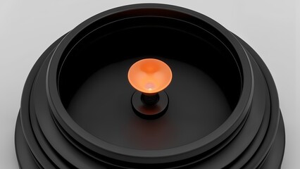 A close-up view of an orange light in a black circular object.