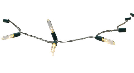 Small decorative LED lights with elongated transparent bulbs emit a soft warm white glow, arranged in a subtle curve against a stark white background with copy space, festive atmosphere