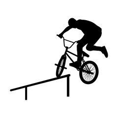 Obraz premium BMX Rider Performing Extreme Trick on Metal Rail Silhouette.