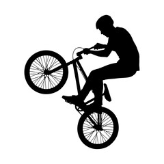 Obraz premium Silhouette of Cyclist Performing Extreme BMX Bike Trick.