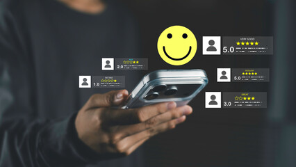 A user checking product reviews and star ratings on a mobile device with a smiley face symbolizing customer satisfaction and positive feedback.
